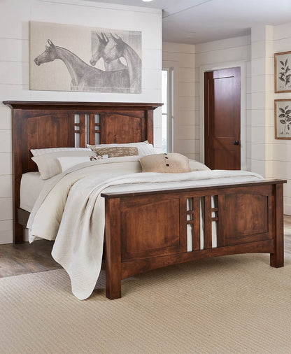 Wooden bed in a bedroom with white bedding and decorative pillows.