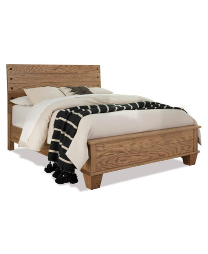 Wooden bed with white bedding and a black and white blanket on a white background