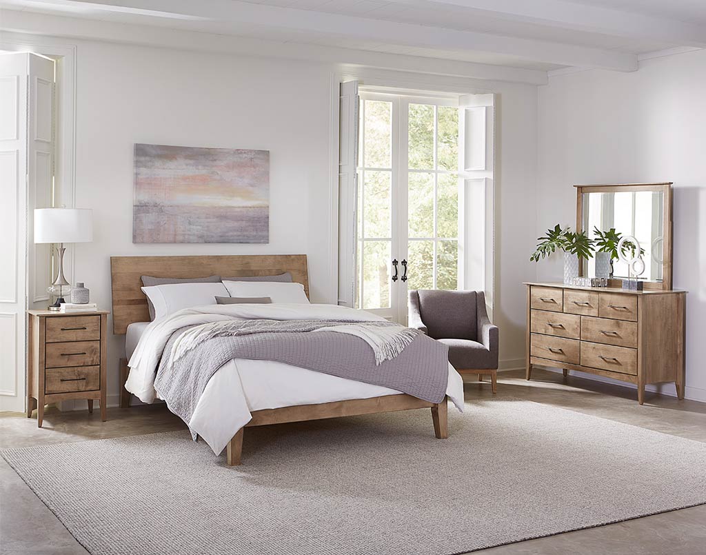 Modern bedroom with wooden furniture including a bed, nightstands, and dresser.
