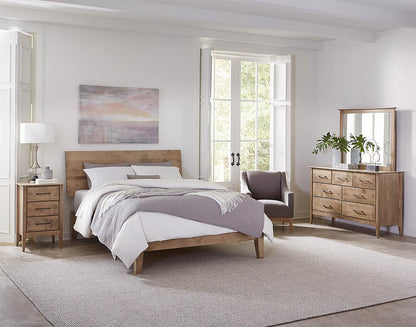 Modern bedroom with wooden furniture including a bed, nightstands, and dresser.