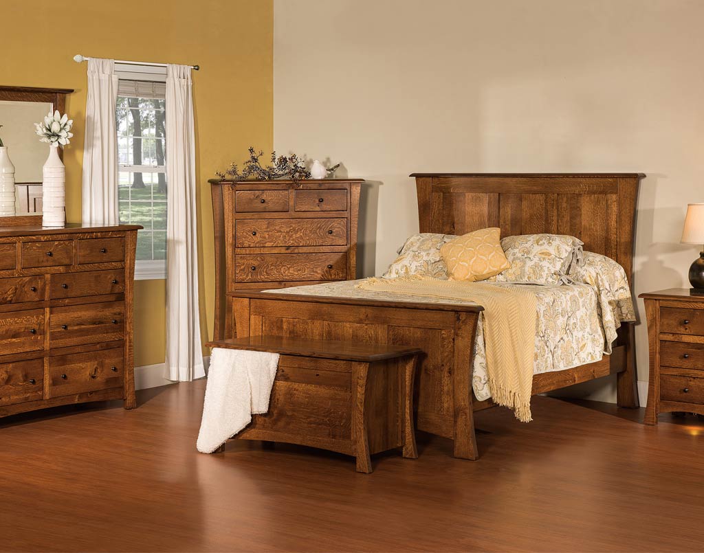 Wooden bedroom furniture set including bed, dresser, and nightstands in a room with yellow walls. (Complete bedroom set coming soon)