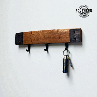 Engraved stave coat rack